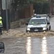 Maltempo, nubifragio Roma: traffico in tilt, gente su tetti10