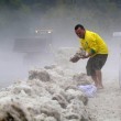 Brasile, violenta grandinata a San Paolo: strade ricoperte, ruspe in azione 01