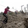Brasile, violenta grandinata a San Paolo: strade ricoperte, ruspe in azione 02