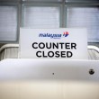 Aereo Malaysia abbattuto: familiari piangono le vittime15