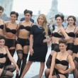 in reggiseno e mutandine sul Millenium Bridge per promuovere il designer Peter Hahn04