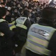Capodanno Shangai, lancio di dollari falsi e calca. 35 morti 3
