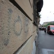 "Nessuno tocchi Milano": in migliaia a ripulire muri e scritte dei black bloc 12