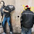 Bansky, Steve Jobs "migrante": sacco in spalla e Mac