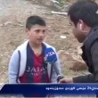 Il bimbo con la maglia di messi intervistato dalla tv del Kurdistan