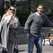 Ilary Blasi e Totti escono da clinica con Isabel