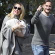 Ilary Blasi e Totti escono da clinica con Isabel 6