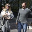 Ilary Blasi e Totti escono da clinica con Isabel 3