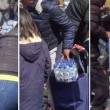 Pubblico ruba acqua minerale durante Maratona Londra4