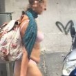 Napoli, in slip e reggiseno a passeggio al rione Sanità FOTO