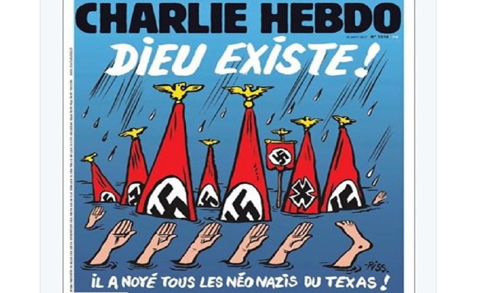Charlie Hebdo, la copertina sull'uragano Harvey: "Dio esiste. Ha annegato i neonazisti in Texas" FOTO