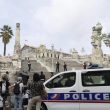 Police cars park outside the Marseille railway station, Sunday, Oct. 1, 2017. French police warn people to avoid Marseille's main train station amid reports of knife attack, assailant shot dead. (ANSA/AP Photo/Claude Paris) [CopyrightNotice: Copyright 2017 The Associated Press. All rights reserved.]