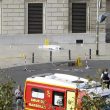 A body lies under a white sheet outside Marseille 's main train station Sunday, Oct. 1, 2017 in Marseille, southern France. A man with a knife attacked people at the main train station in the southeastern French city of Marseille on Sunday, killing two women before soldiers fatally shot the assailant, officials said. (ANSA/AP Photo/Claude Paris) [CopyrightNotice: Copyright 2017 The Associated Press. All rights reserved.]