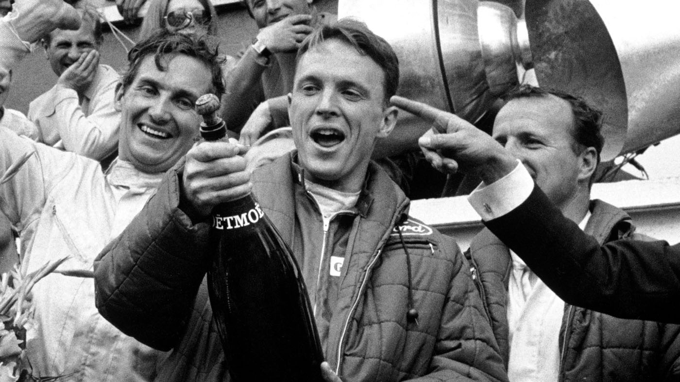 dan-gurney-morto-champagne