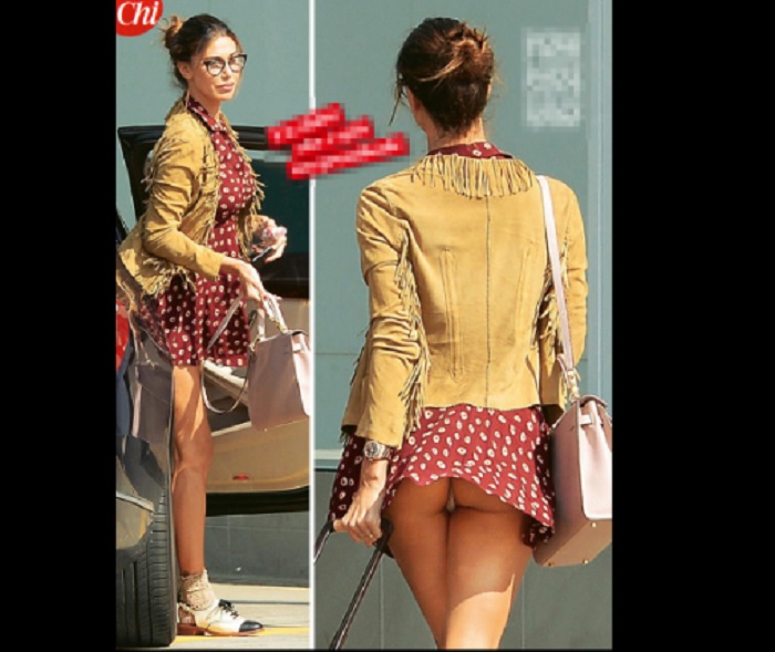 Belen Rodriguez in aeroporto: il vento le alza il vestito e... FOTO