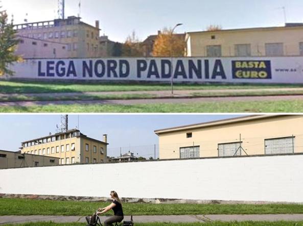 Lega cancella scritta "Basta euro" dal muro della sede di via Bellerio a Milano FOTO