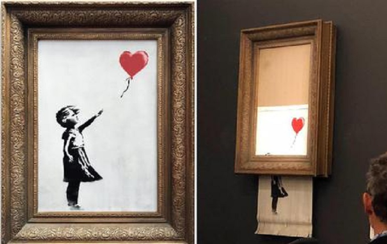 Tagliuzza la stampa di Bansky da 40mila sterline: ora vale una sterlina (foto Ansa)