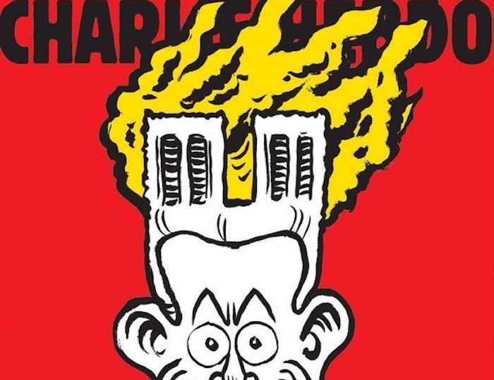 Notre-Dame, la vignetta di Charlie Hebdo è un'accusa a Macron. Insulti italiani: "Avete riso dei nostri morti"