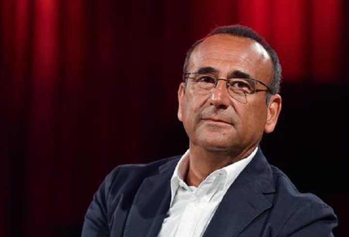 Carlo Conti: "Avevo il posto fisso ma... preferivo Panariello e Pieraccioni" (foto Ansa)