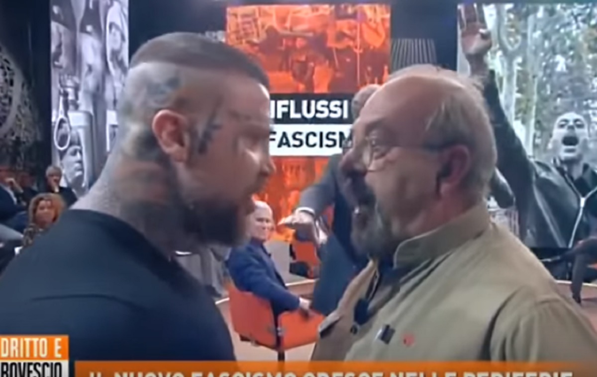Vauro e "Brasile", rissa in diretta: "Fascio di m...", "puzzi de vino". Quasi si menano VIDEO