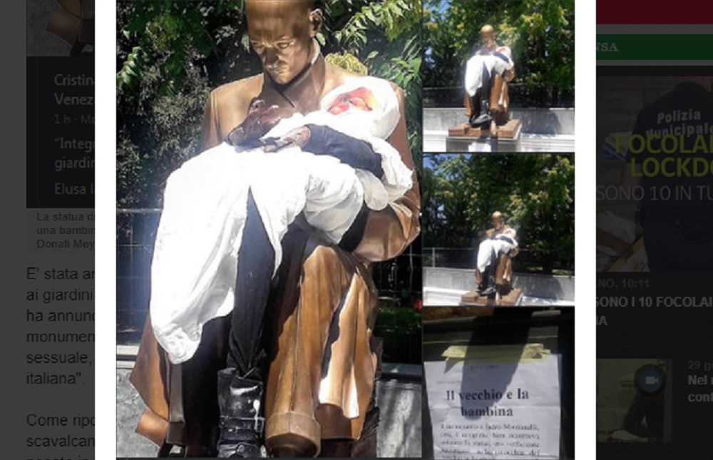 Statua Montanelli ancora presa di mira, ora ha una bambola di una bimba in braccio FOTO